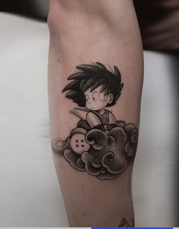 Goku de niño sobre su nube, de Dragon Ball, en puntillismo en el antebrazo.